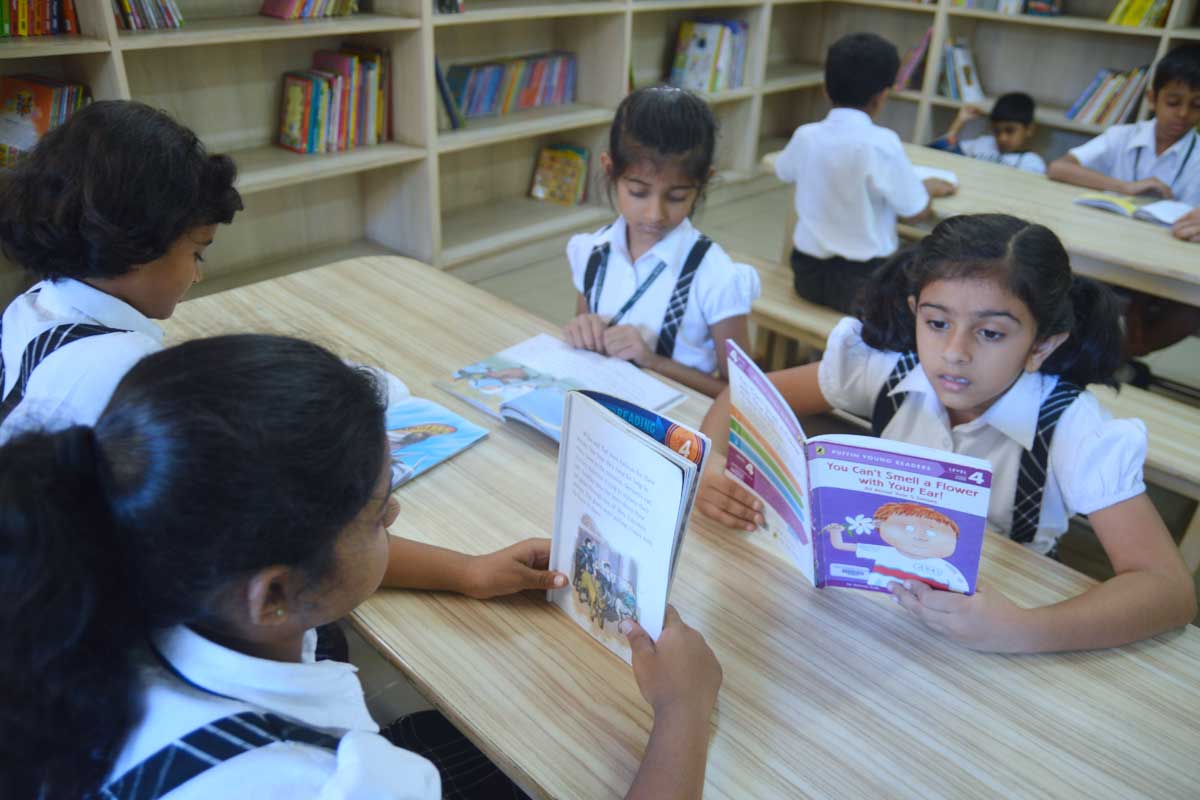 Students reading at New Horizon Gurukul School Library