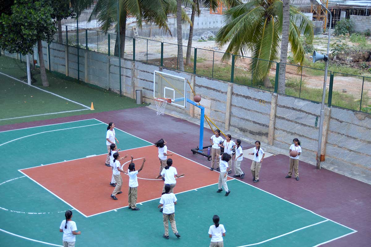 New horizon Gurukul Students at Basketball court area - NHG