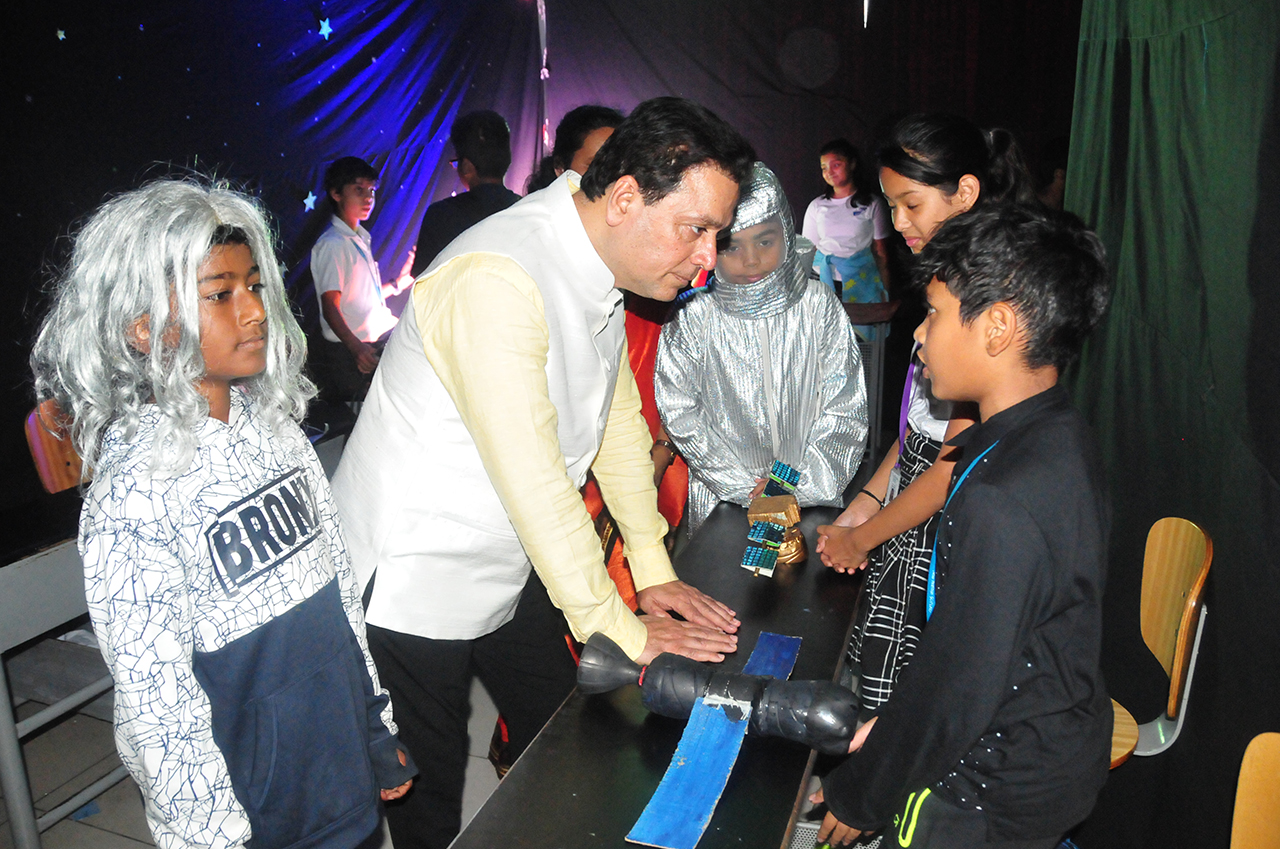 Chairman Interating with children at GYAN MELA - NHG